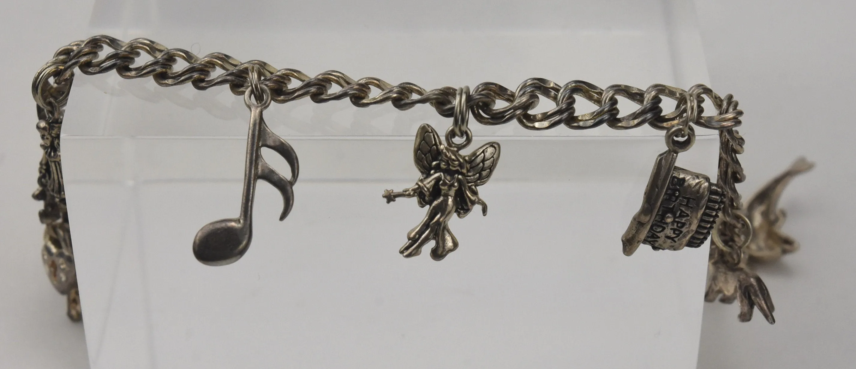 Vintage Sterling Silver Charm Bracelet with Dolphin, Dachshund, Fairy, and More! - 8.25"