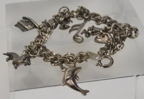 Vintage Sterling Silver Charm Bracelet with Dolphin, Dachshund, Fairy, and More! - 8.25"